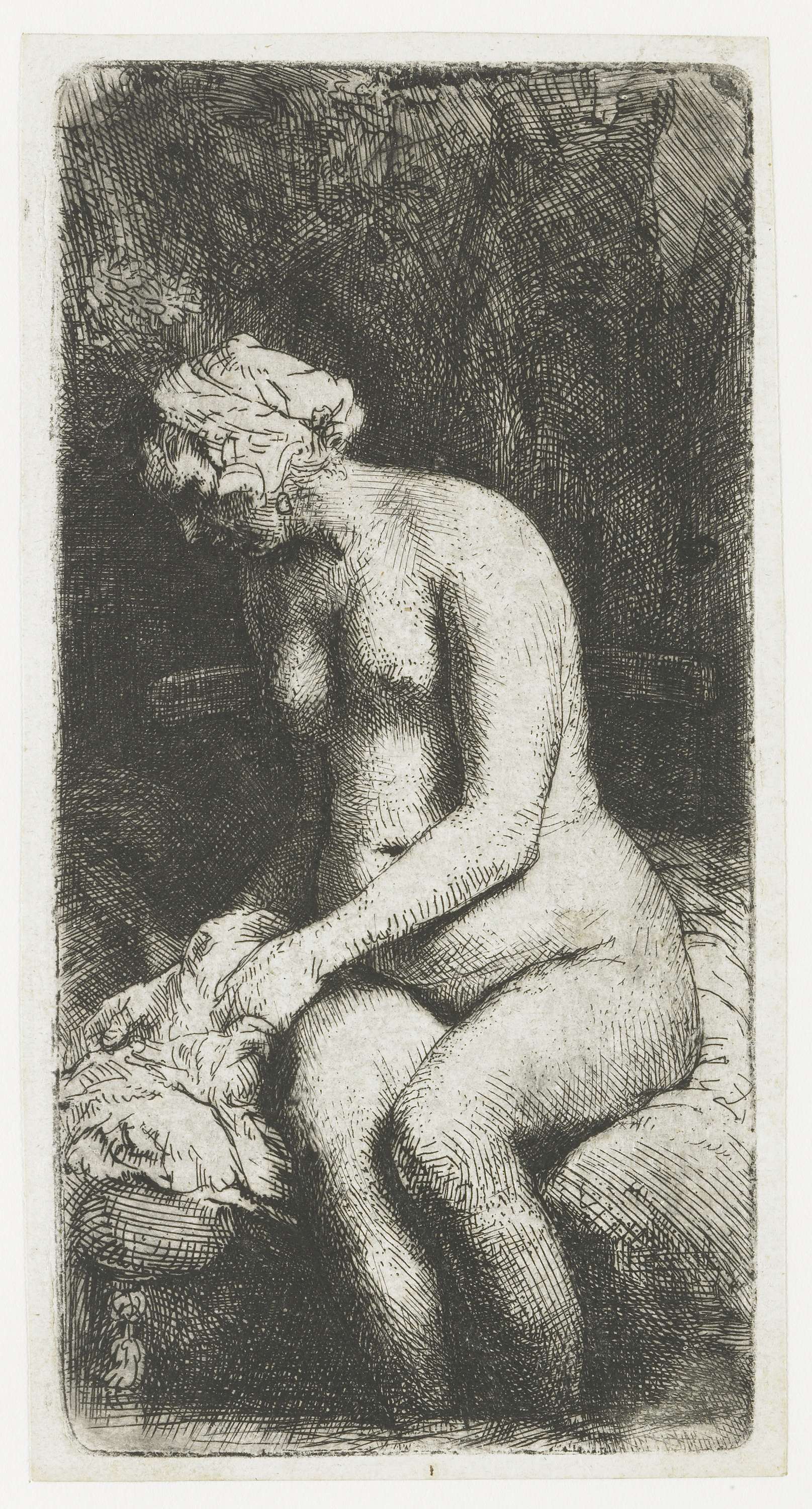 Woman bathing her feet in a brook, etching by Rembrandt van Rijn
