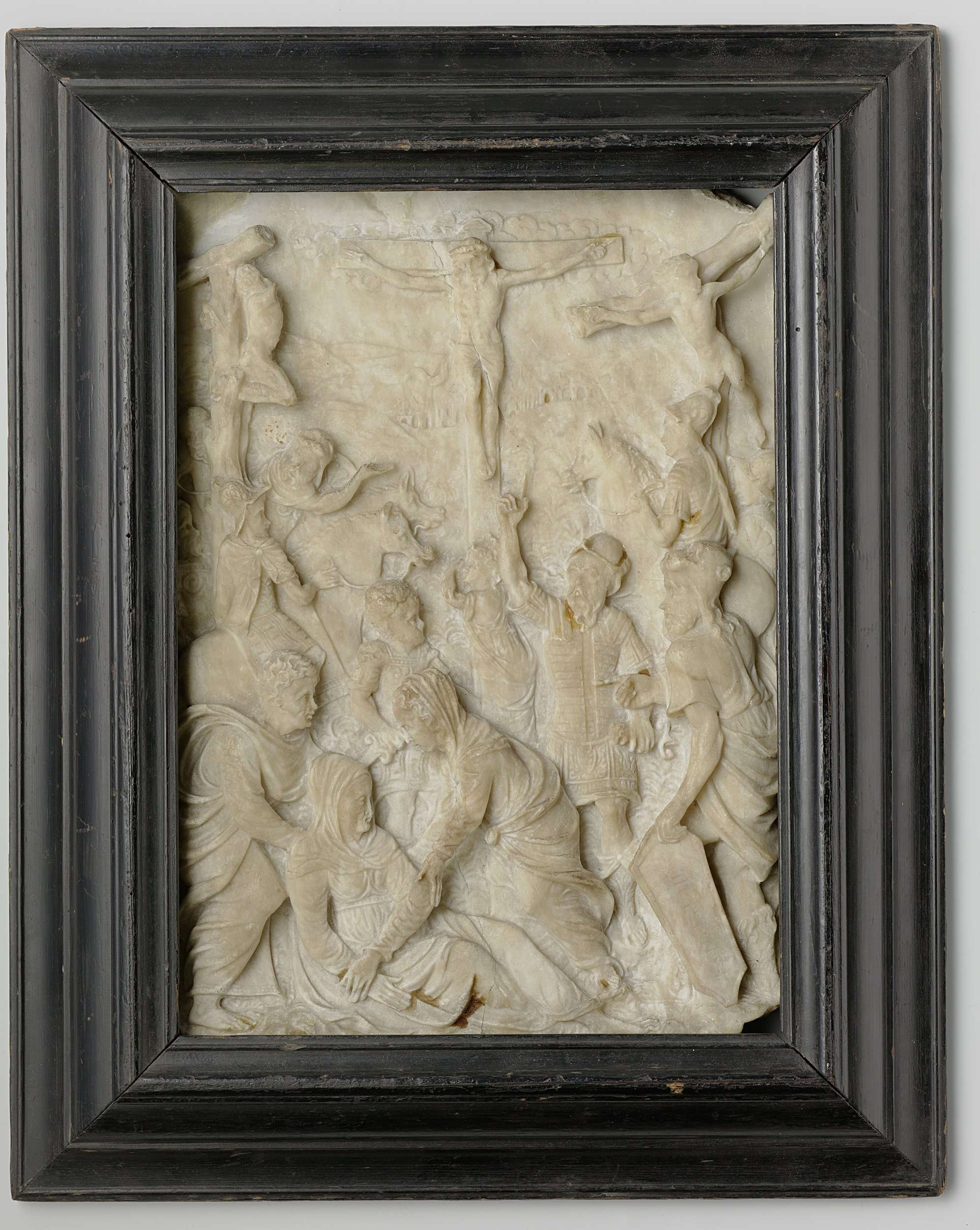 Calvary sculpture by Unknown Artist, alabaster medium, depicting a cross against a muted sky.