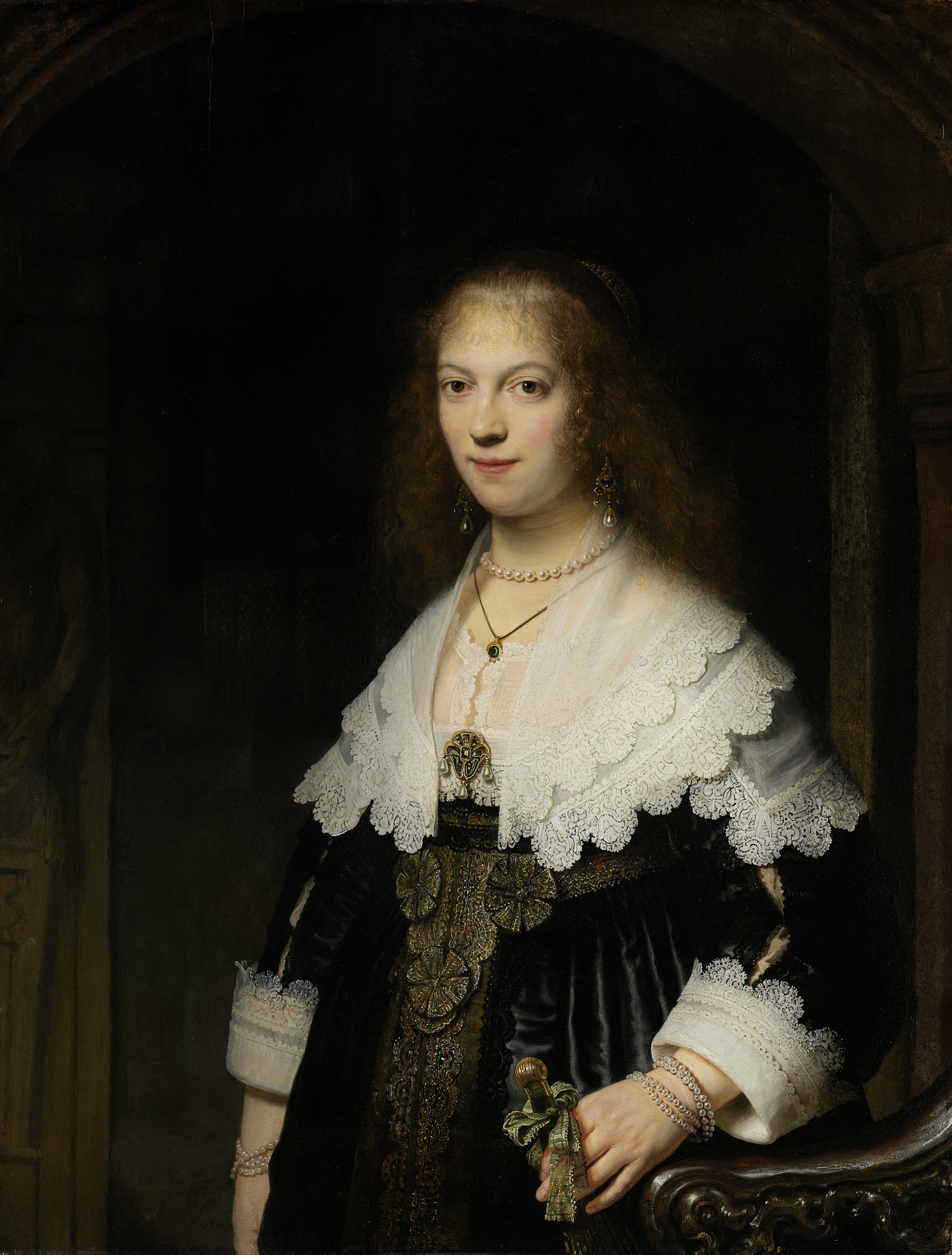 Portrait of a woman holding a fan, oil on panel by Rembrandt van Rijn