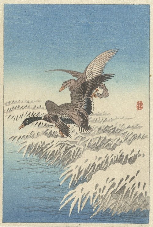 A serene depiction of ducks flying over a snowy landscape.
