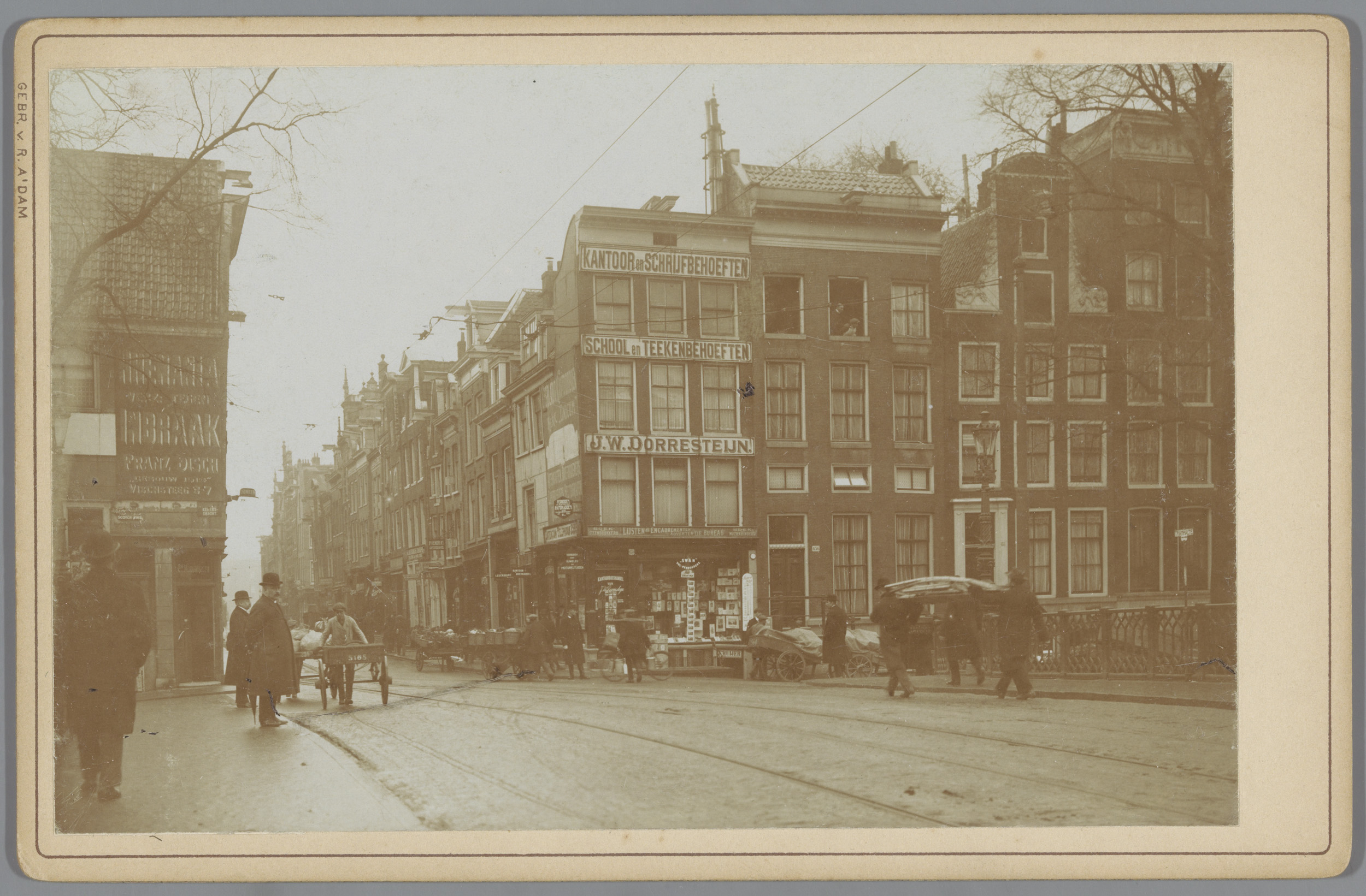 Genre scene photograph by Gebr. van R. depicting a street view in Amsterdam