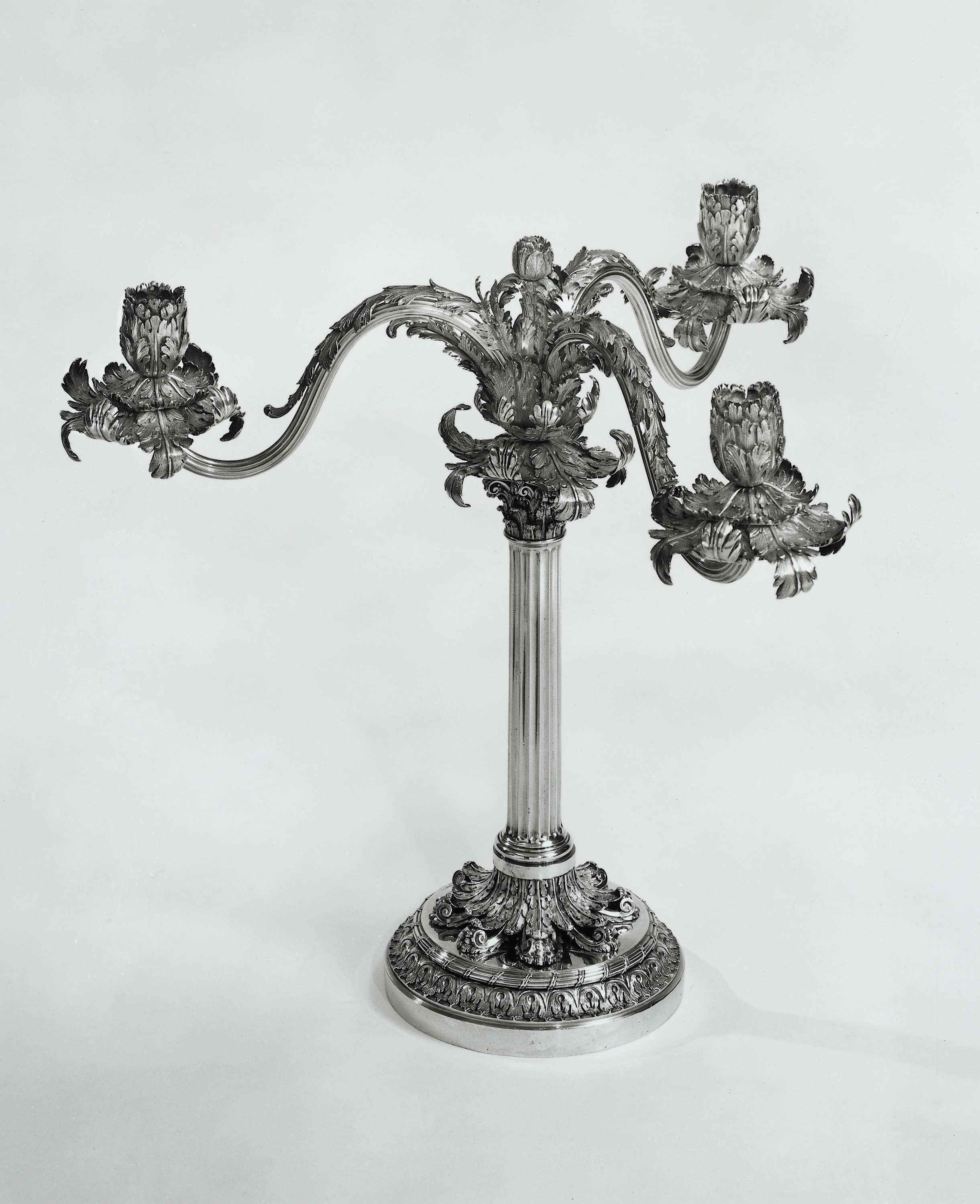 Pair of three-branch candelabra made of metal by Johannes Schiotling