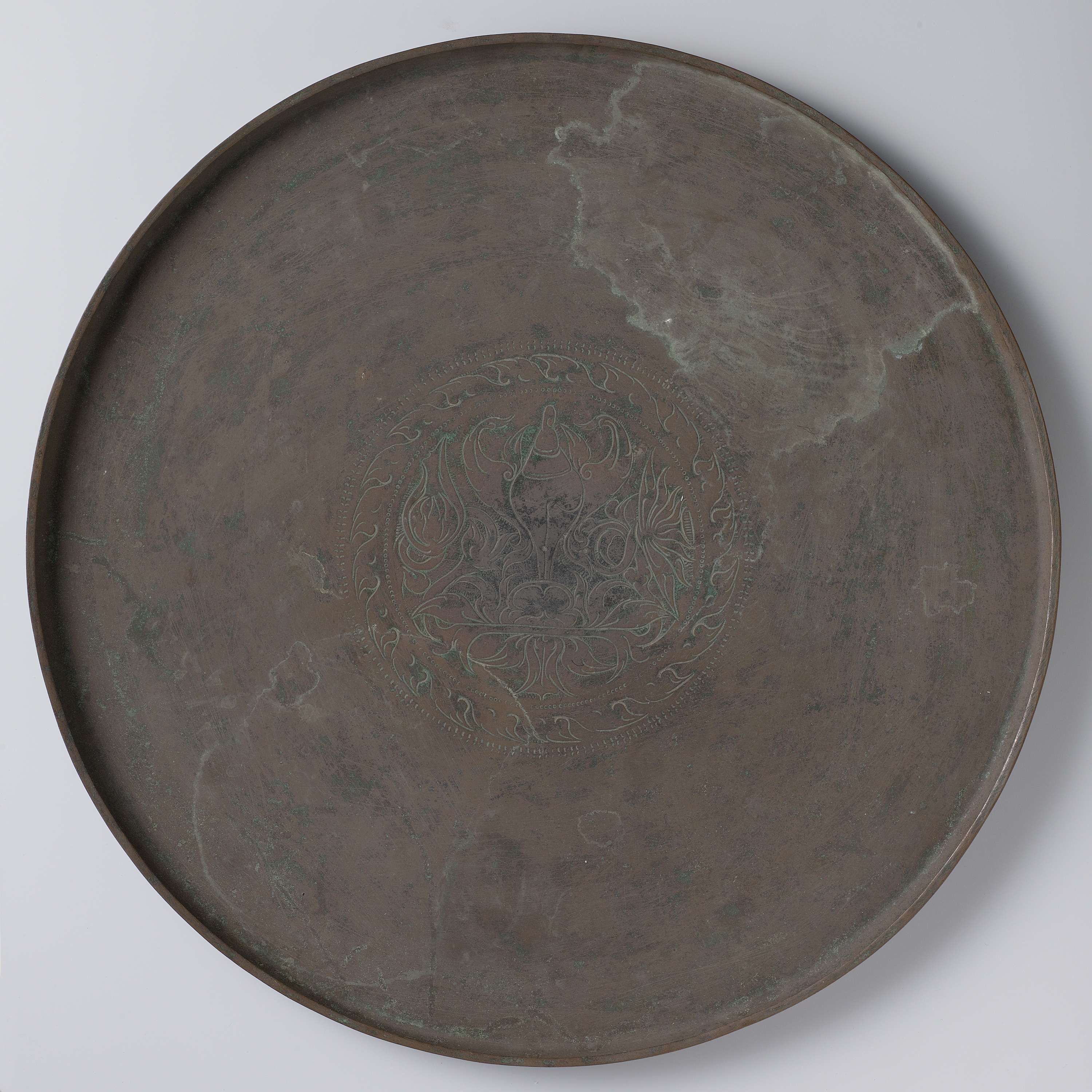Bronze decorative art by Unknown Artist featuring intricate patterns and motifs.