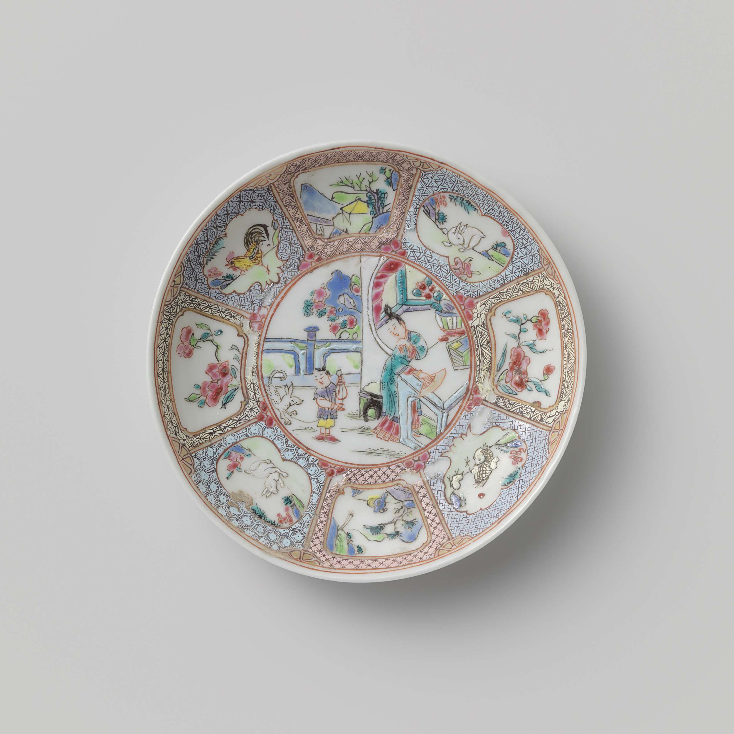 Porcelain saucer featuring a woman and boy near a pavilion, Unknown Artist
