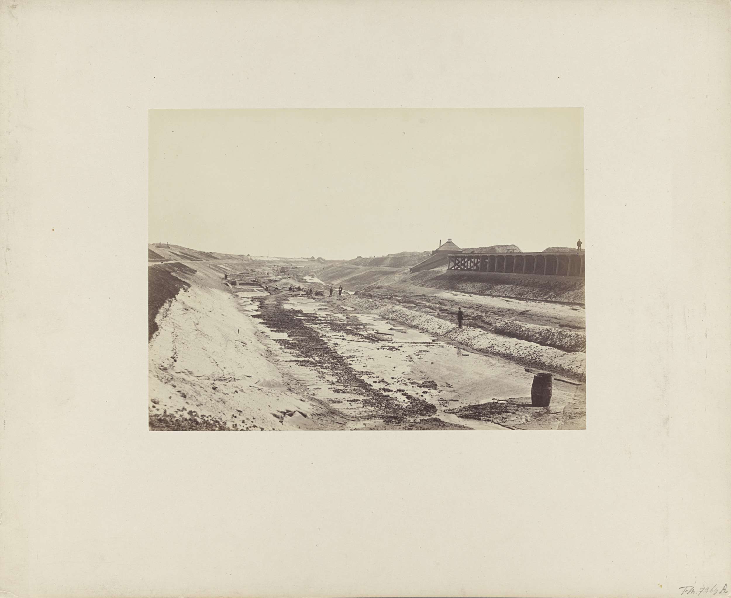 Aanleg Noordzeekanaal, albumen print by Rudolph Guicherit showing a landscape with water and industry.