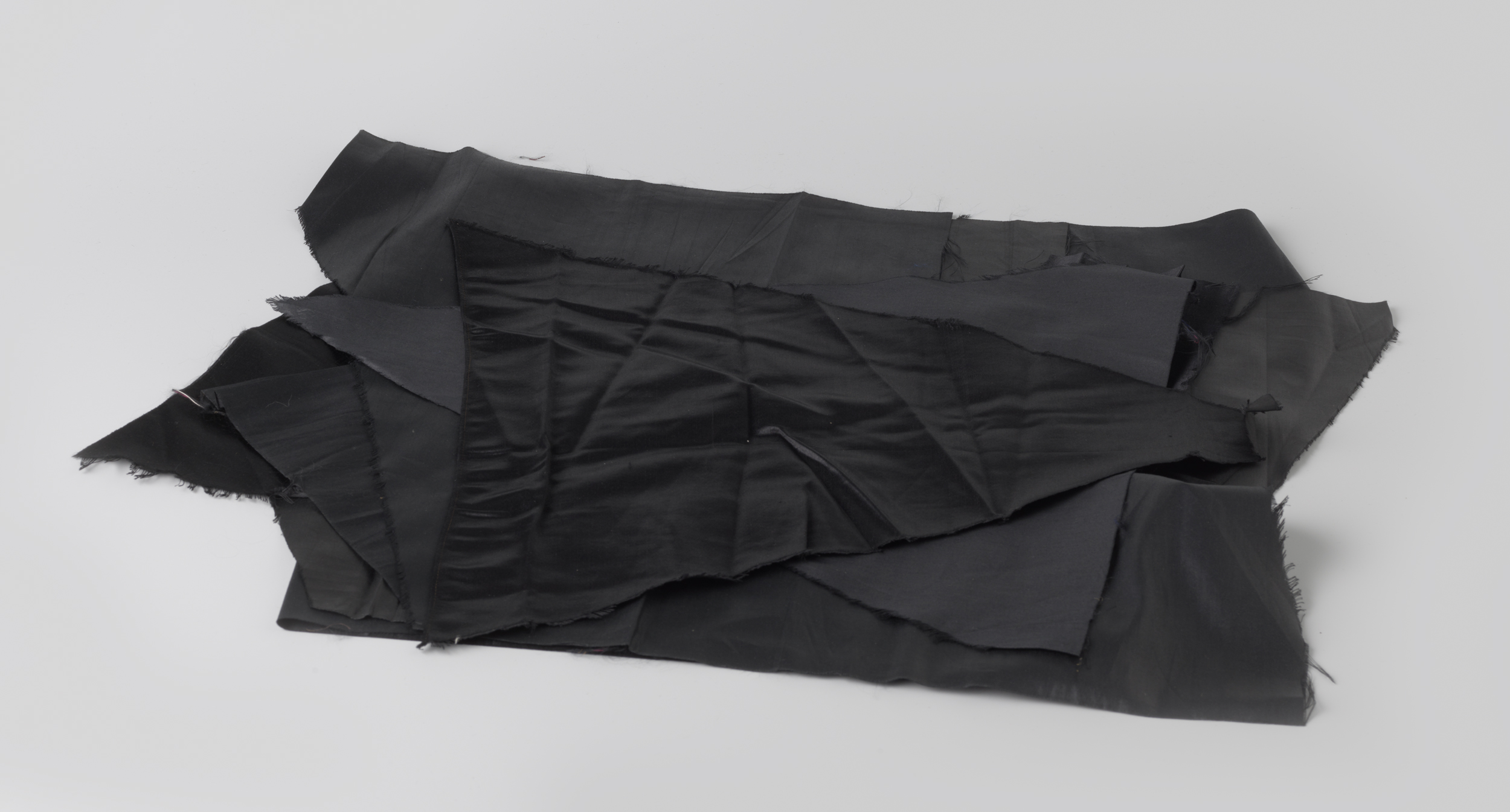 Abstract black satin fabric by Unknown Artist