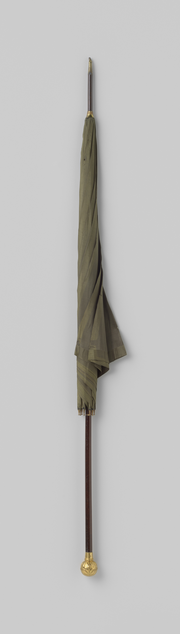 Silk parasol with a green canopy and golden knob by Unknown Artist