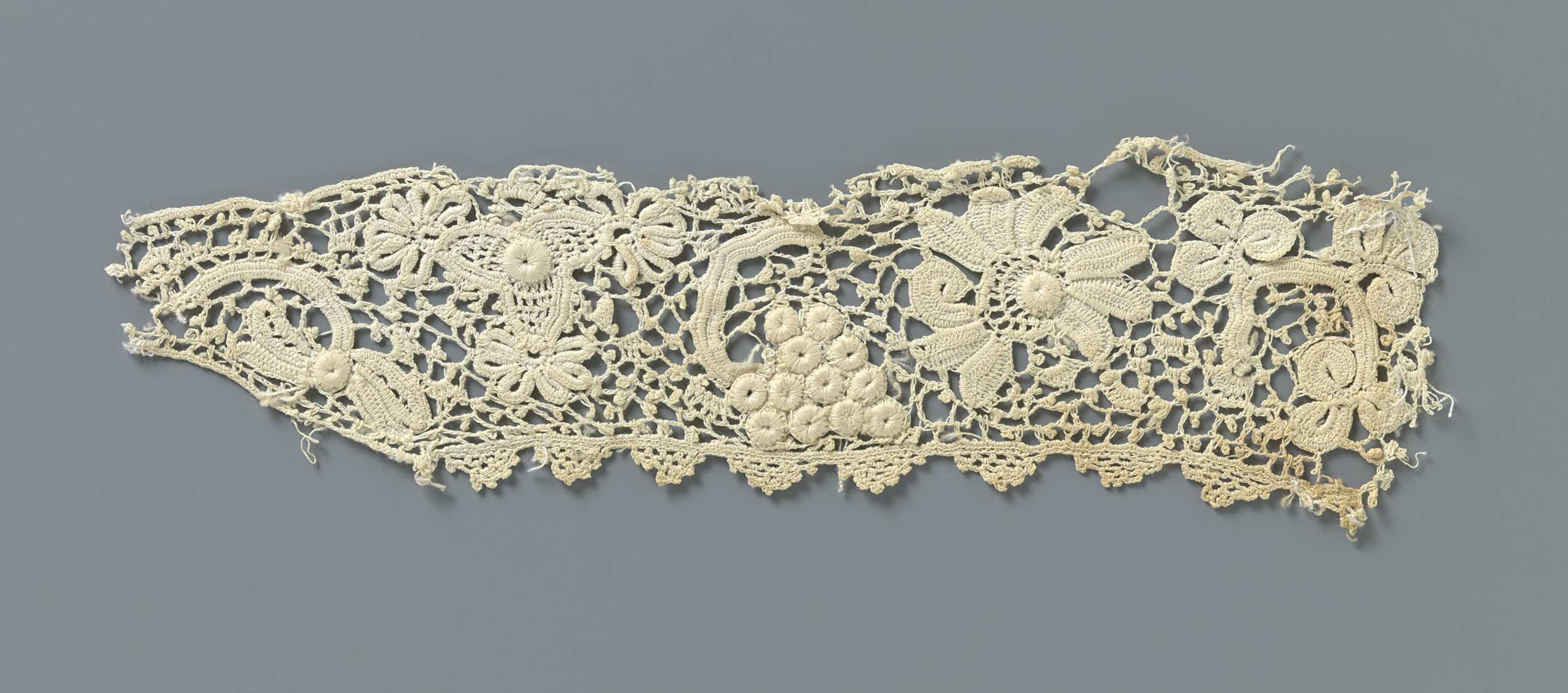 Intricate textile tapestry with floral motifs by Unknown Artist