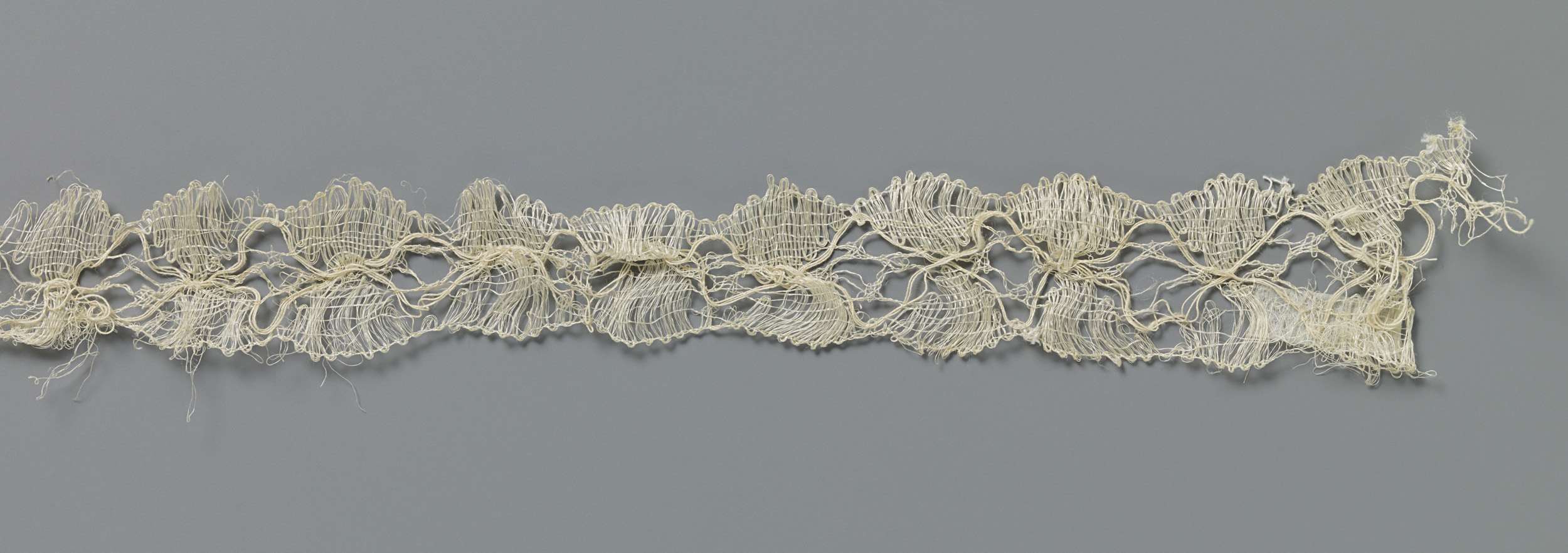 Intricate lacework with a diamond-shaped field by an unknown artist, medium lace.