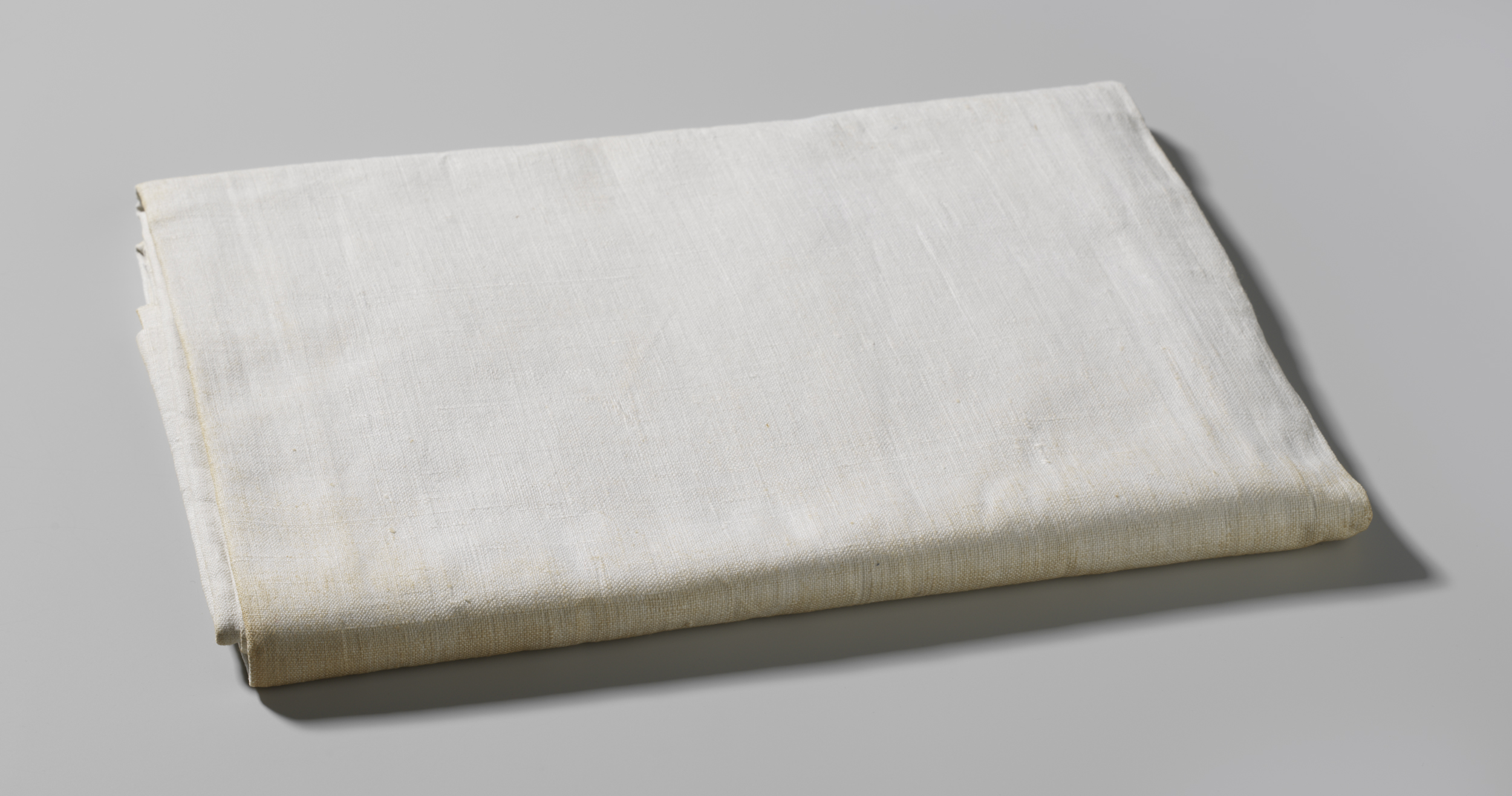 Linen tapestry titled Laken by Unknown Artist, featuring soft light and shadow play