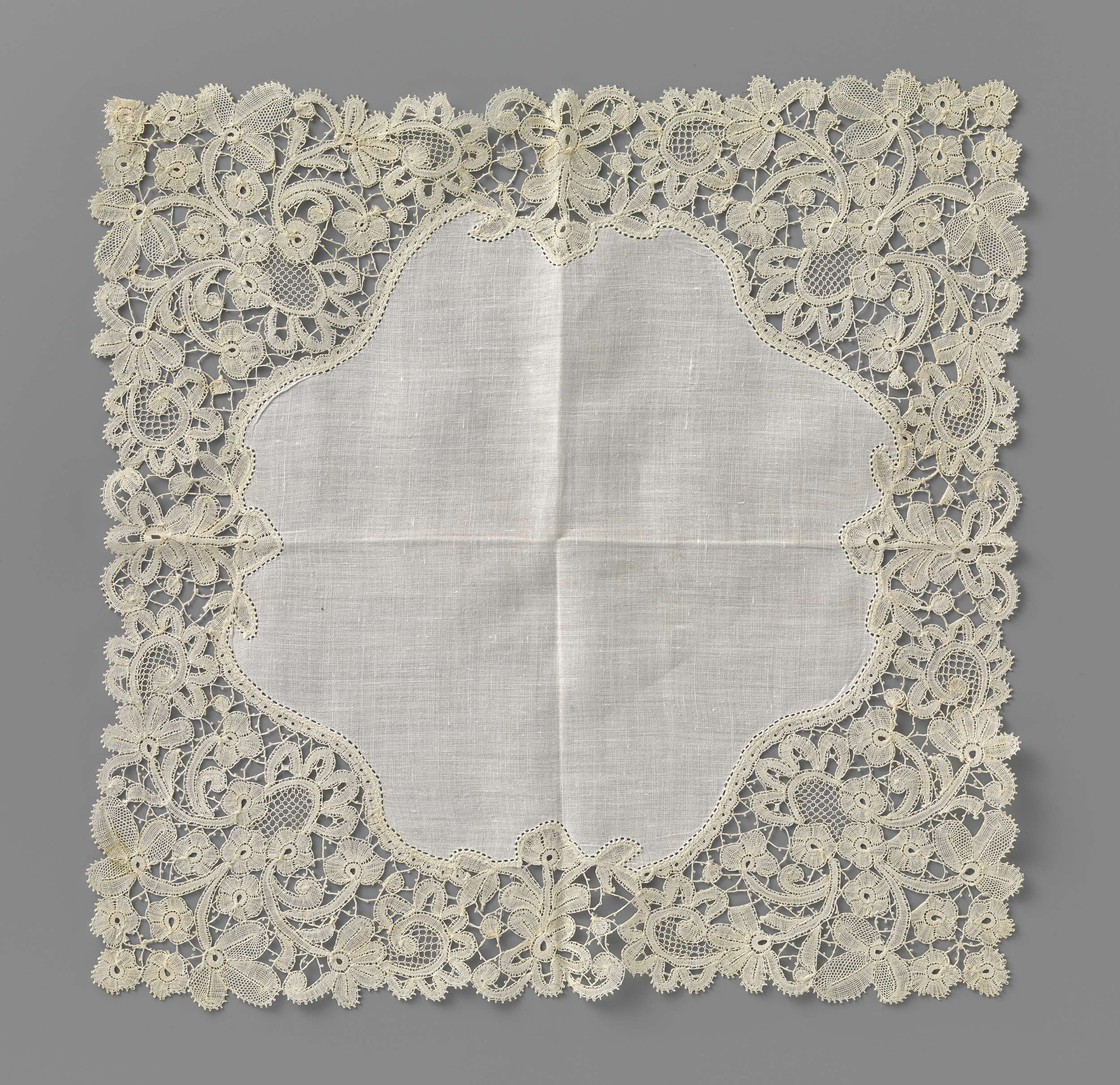 Delicate lace handkerchief with a three-leaf motif by Unknown Artist