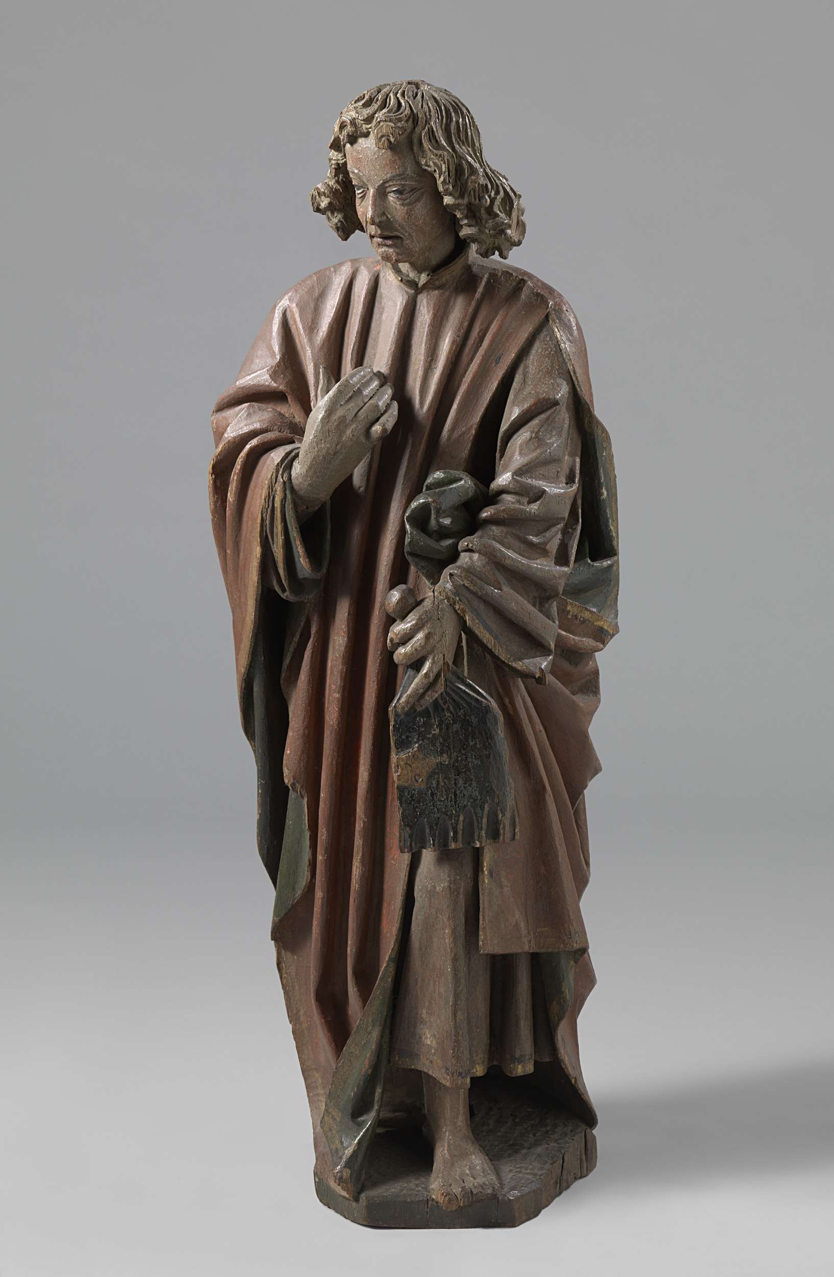 St John the Evangelist by Arnt van Tricht, oak medium, features a serene figure illuminated by soft light.