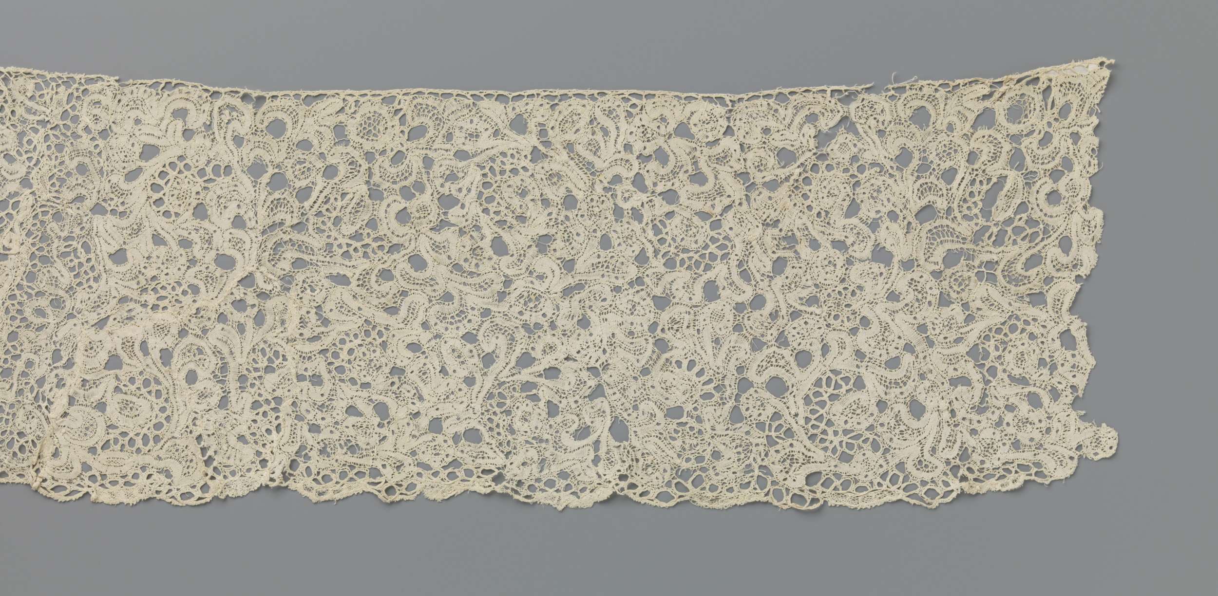 Lace work featuring swirling leaves by Unknown Artist