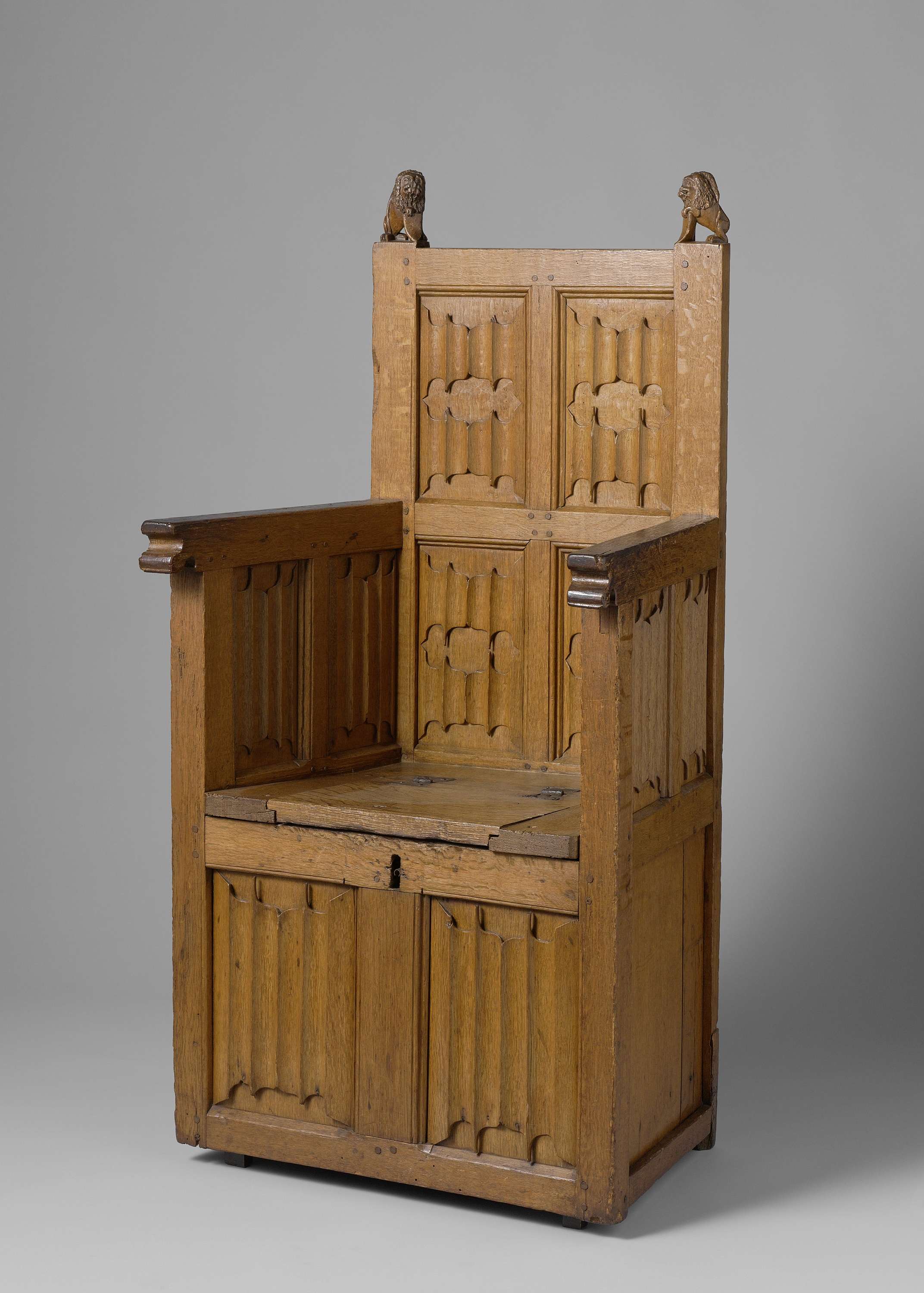 Wooden chair with lion-headed supports, crafted from wood by Unknown Artist
