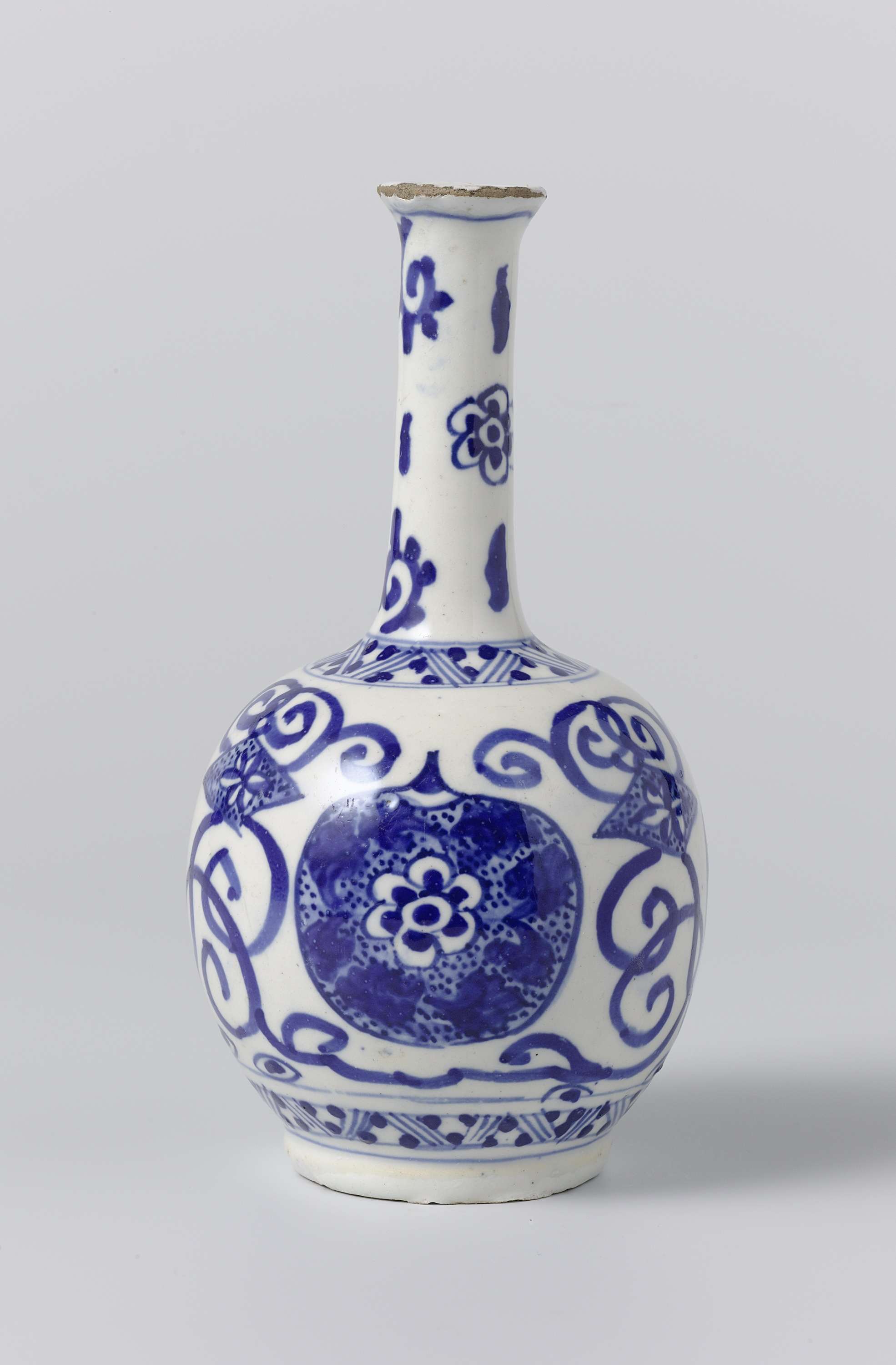 Vaas van faience by De Paauw, faience vase with intricate patterns and colors.