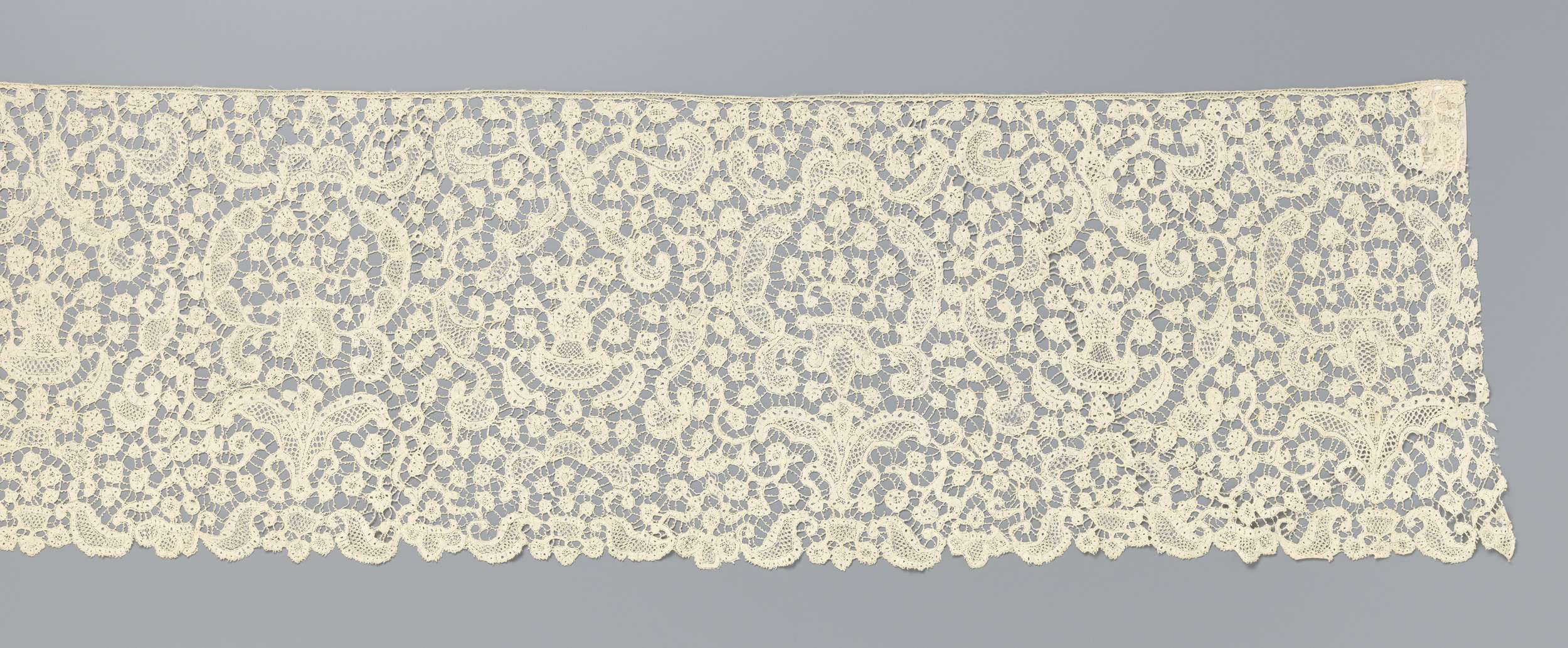 Lace artwork by Unknown Artist featuring floral vases and symmetrical designs