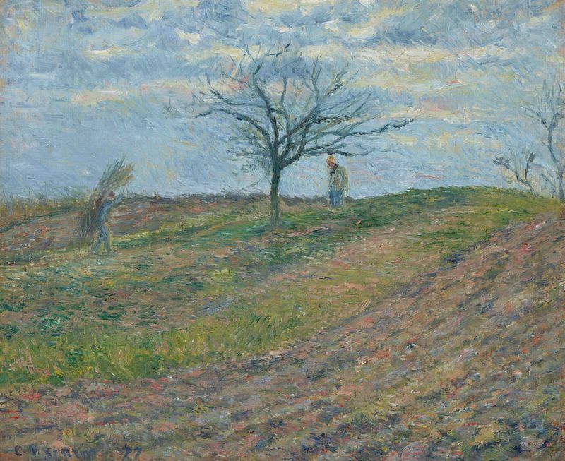 Óleo sobre lienzo de Camille Pissarro que muestra a un trabajador llevando ramitas en un paisaje invernal.