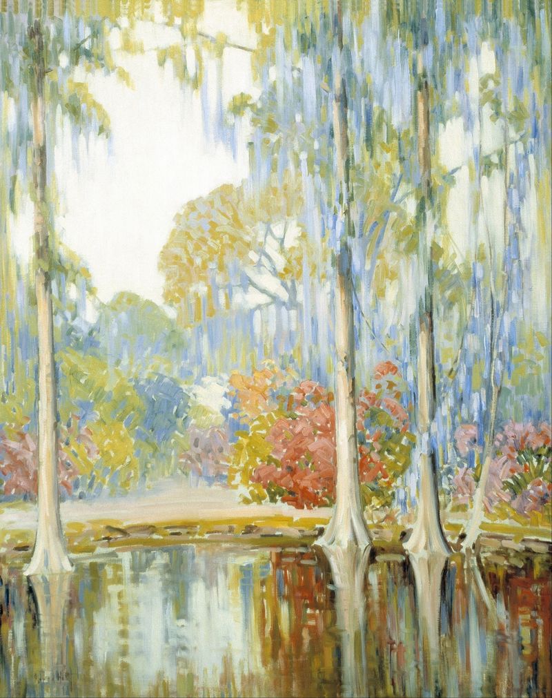Acuarela de Alfred Hutty que representa un jardín tranquilo con flores de magnolia.