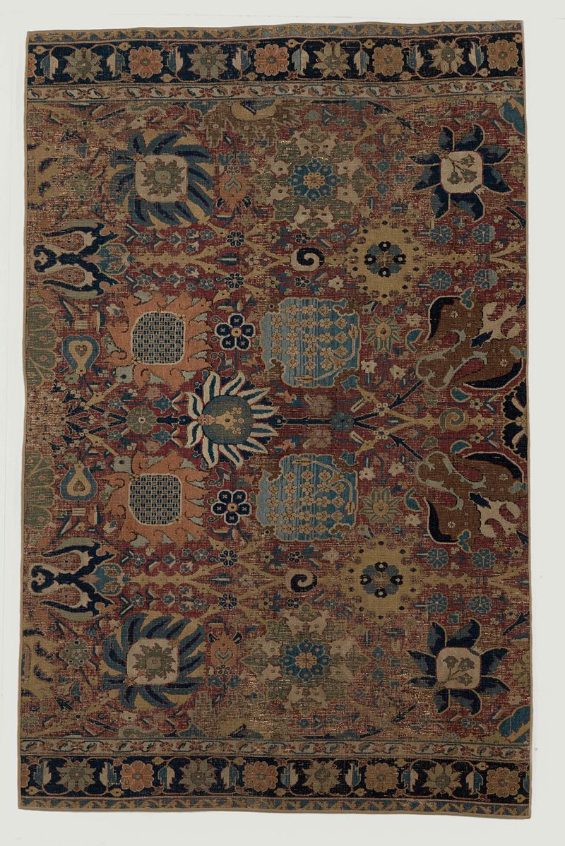 Fragment van een Oosters tapijt, têxtil de lã de c. 1550-1600 com padrões intrincados.