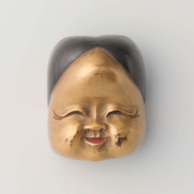 Tallado en madera Netsuke de Tomomasa con detalles intrincados