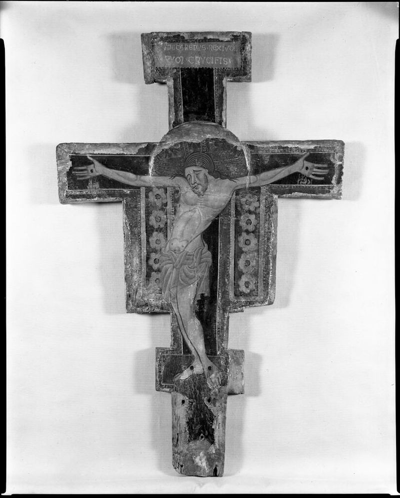 Crucifix, tempera on panel by unidentified artist, depicting Christ with serene expression.