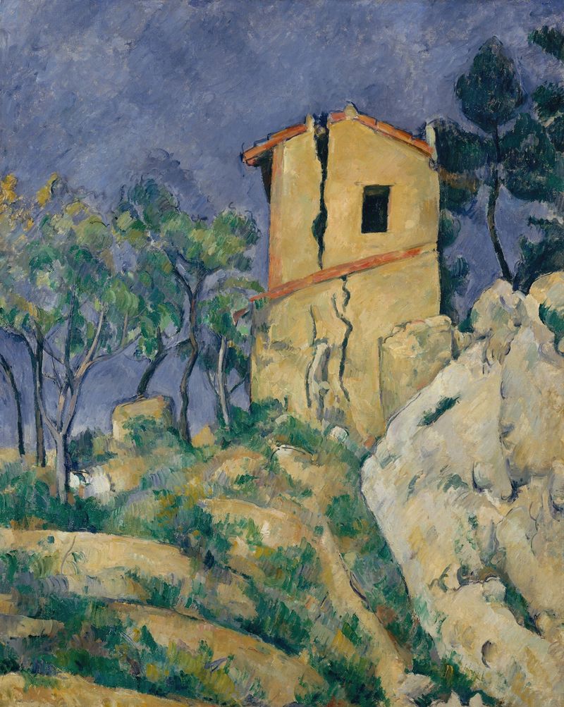 A Casa com as Paredes Rachadas de Paul Cezanne, pintura a óleo de uma casa abandonada sob um céu tempestuoso.