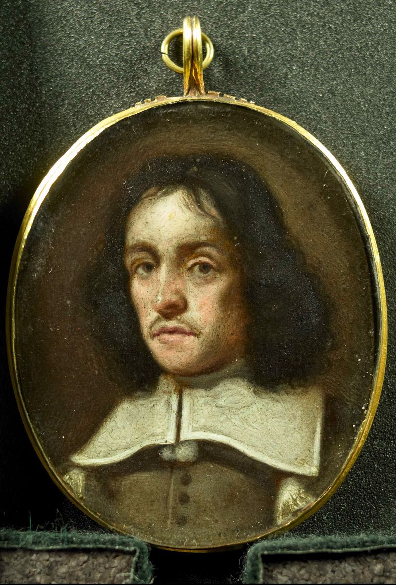 Retrato de um homem em metal de Unknown Artist, com renda intrincada e tecido rico.