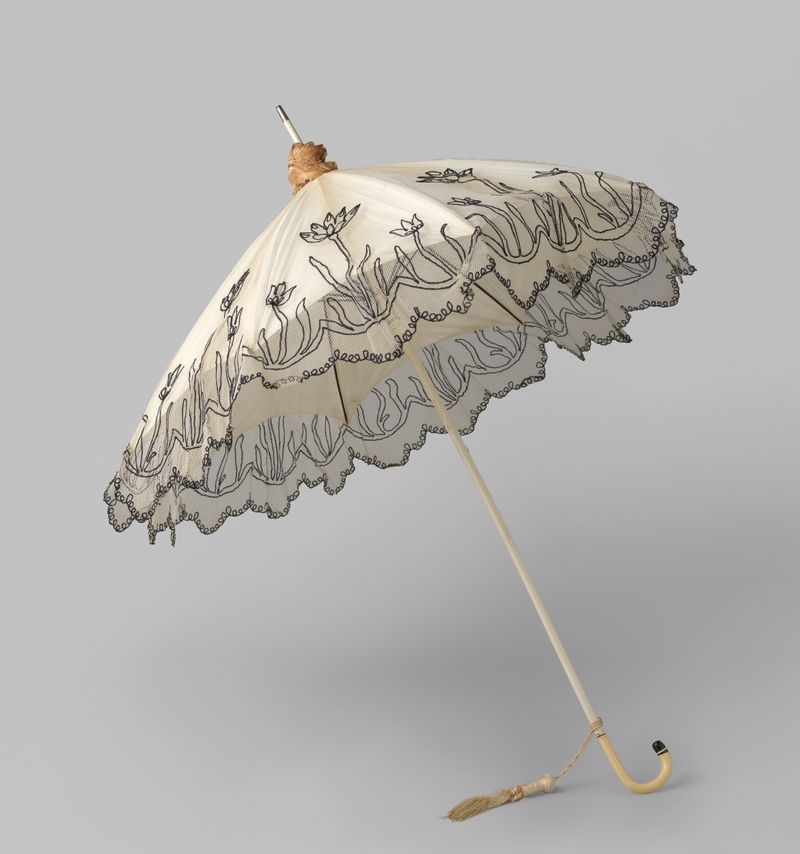 Parasol with white tulle and black embroidery by Gustav Schnitzler