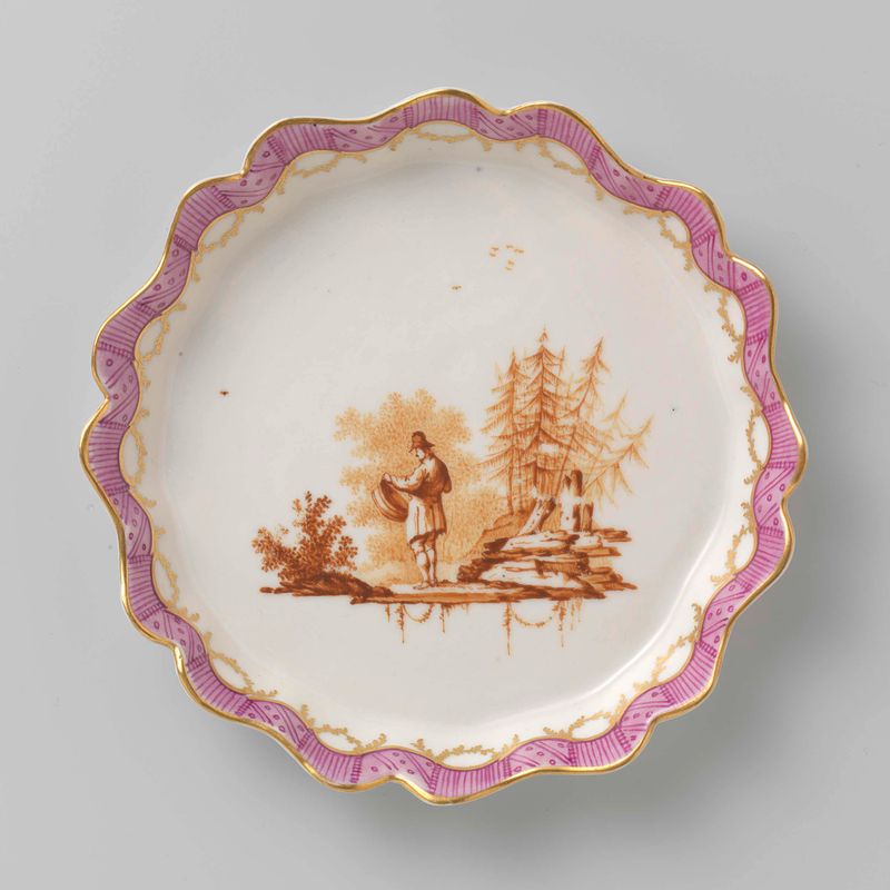 Porcelain tea service by Manufacture Oud-Loosdrecht, featuring a teapot, milk jug, and sugar bowl