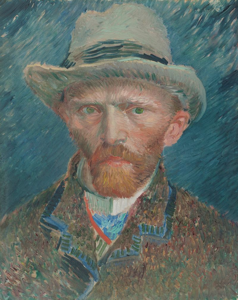 Self-portrait by Vincent van Gogh, oil painting, featuring the artist in fashionable attire.