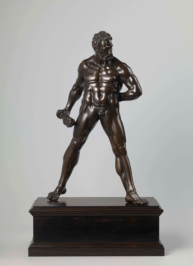 Bronze sculpture of Hercules Pomarius by Willem Danielsz. van Tetrode, holding a club and golden apples.