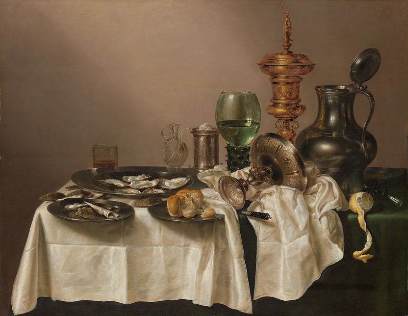 Still life oil painting by Willem Claesz Heda featuring pewter, silver, and glass objects.
