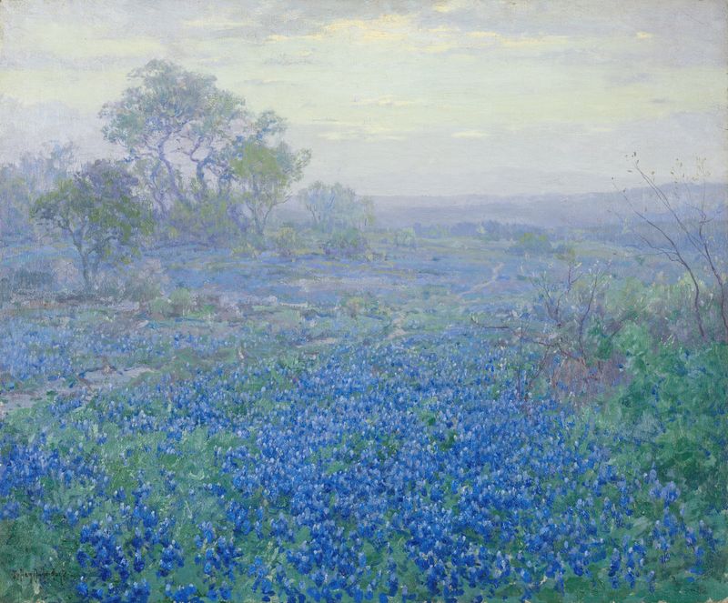 Landscape of bluebonnets under an overcast sky by Julian Onderdonk, oil painting
