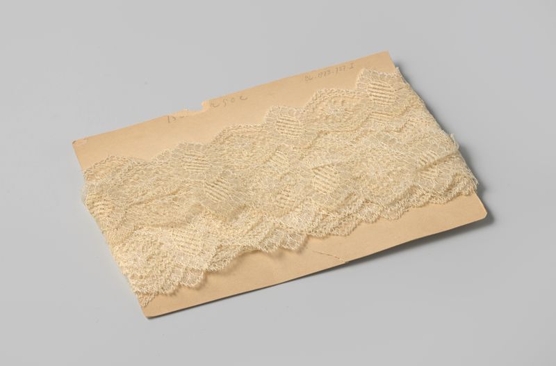 Sculpted white lacework on cardboard by Gustav Schnitzler
