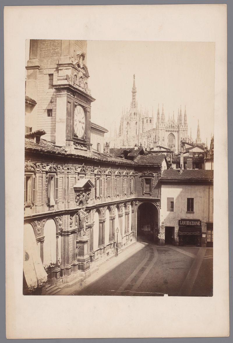 Albumen print by Pompeo Pozzi depicting a street scene with a cathedral in Milan.