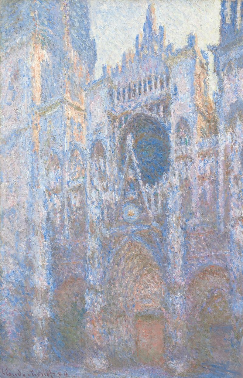 Rouen Cathedral, West Façade de Claude Monet, óleo que muestra arquitectura intrincada y luz.