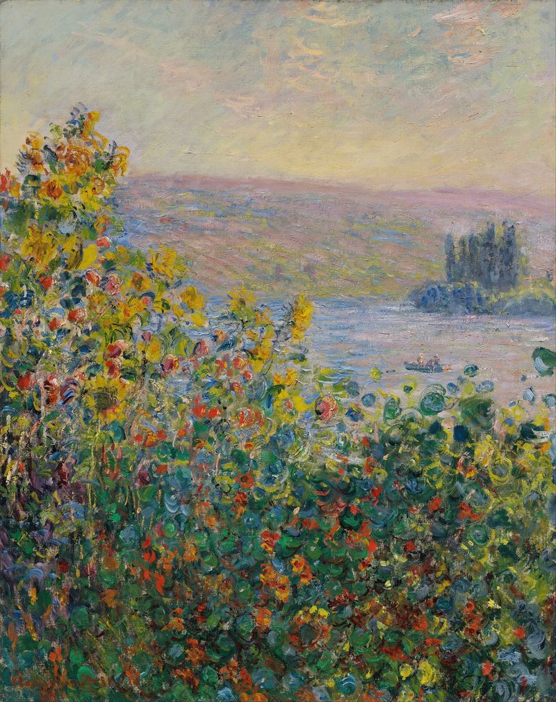 Flower Beds at Vétheuil by Claude Monet, oil painting featuring vibrant flowers in a lush garden.