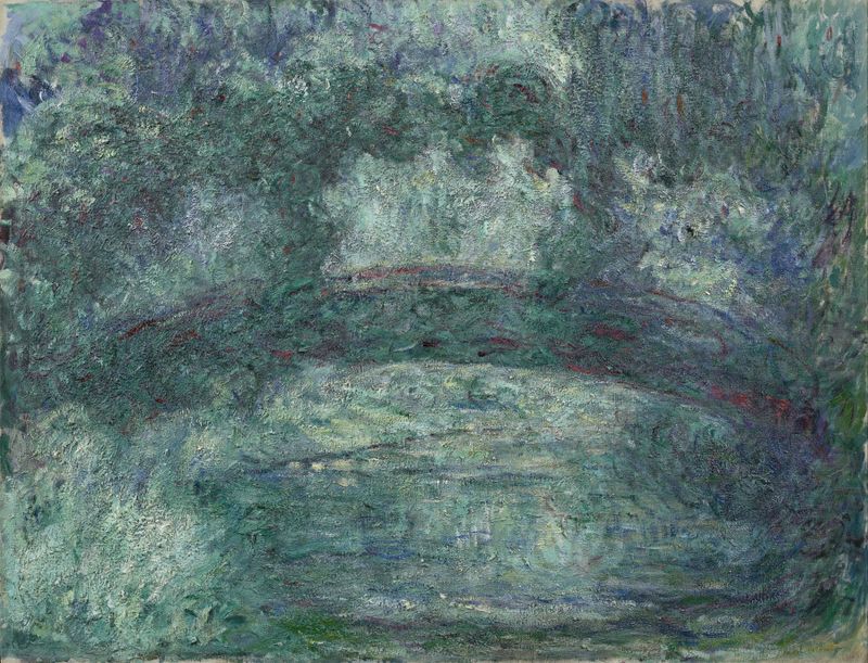 A Ponte Japonesa de Claude Monet, pintura a óleo que mostra uma ponte sobre água cercada de vegetação.