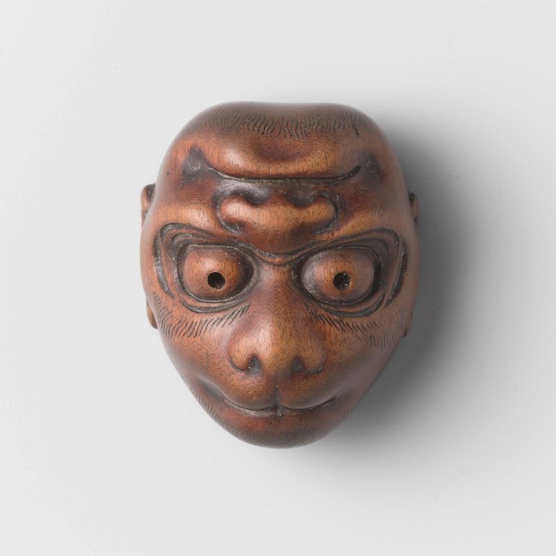 Escultura em madeira Netsuke de Hidemasa com entalhes intrincados