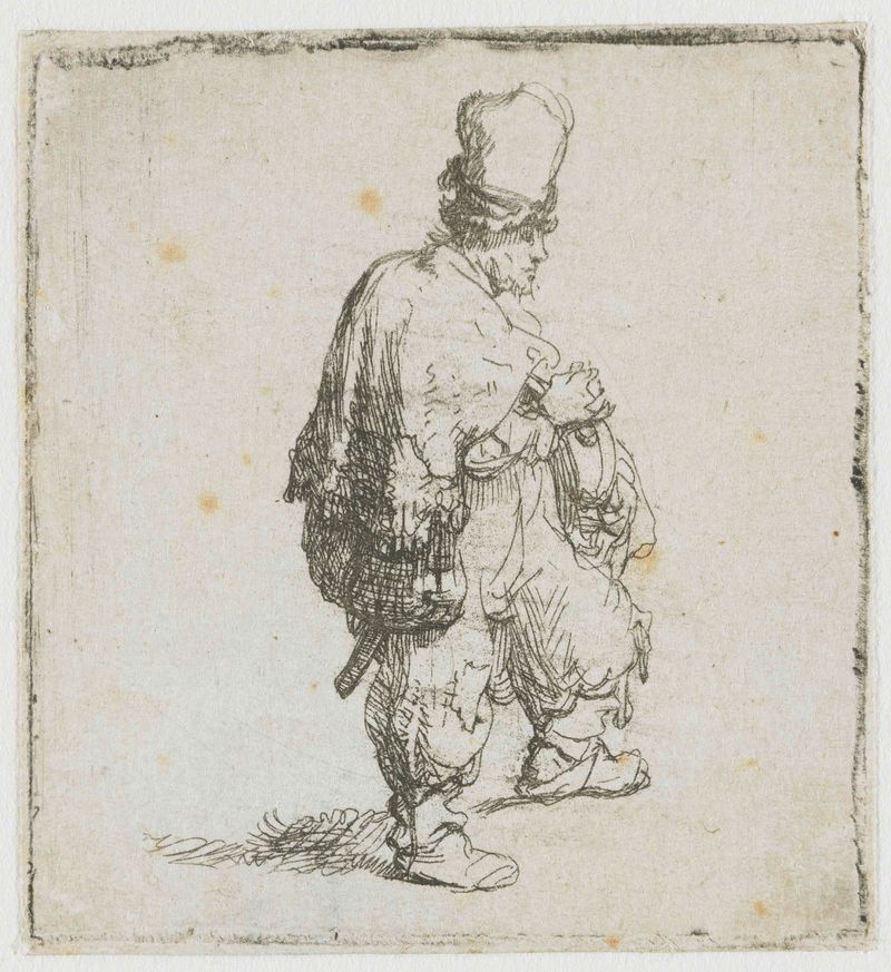 Un jugador de hurdy-gurdy de pie, grabado de Rembrandt van Rijn