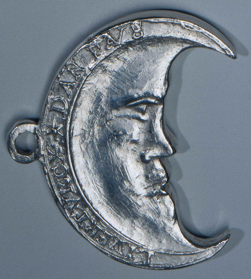 Gravura intitulada Medalha dos Mendigos por artista desconhecido, com símbolo de lua crescente.