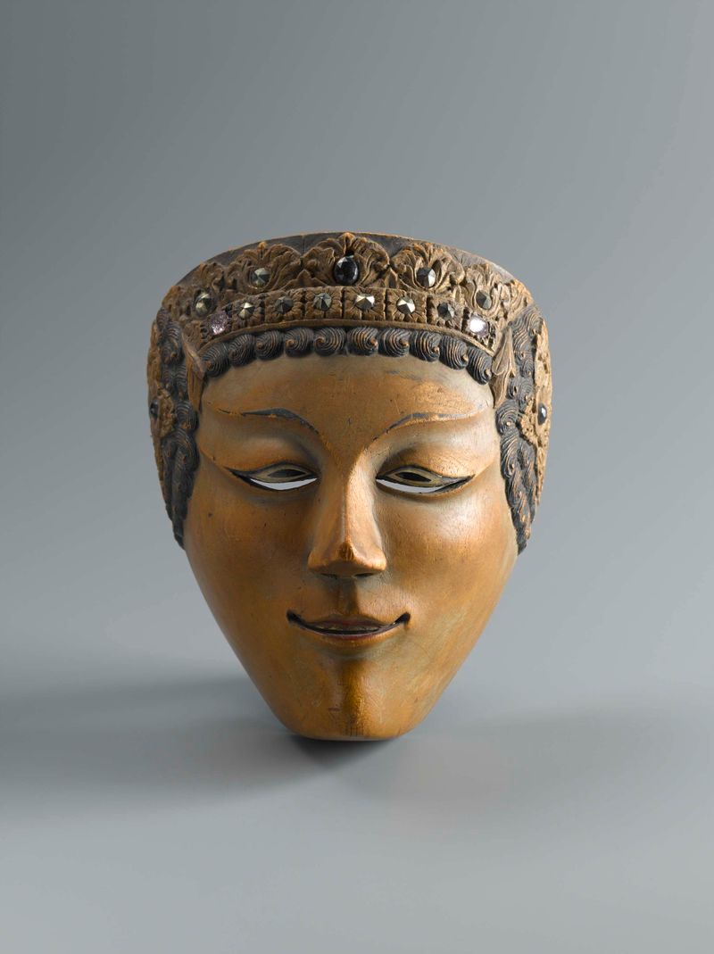 Escultura figurativa em madeira intitulada Masker de um artista desconhecido