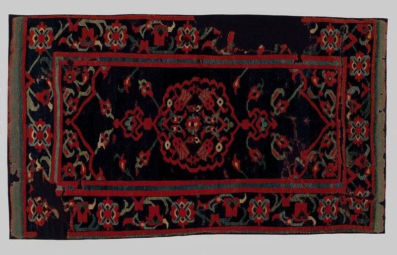 Textil decorativo Medaillonkleed de Unknown Artist, con patrones intrincados y colores vibrantes.