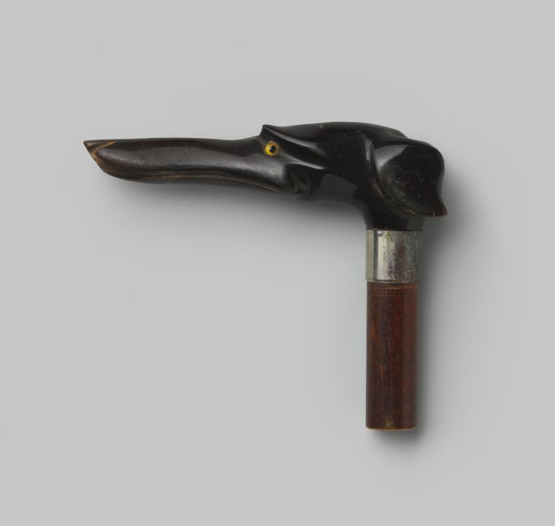Decorative art handle made of wood with a dog head horn knob by Gelria