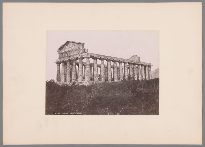 Tempel van Athena in Paestum by Roberto Rive, albumen print showing ancient columns against the sky.