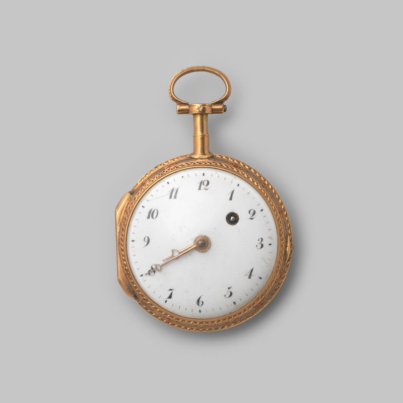 Horloge van goud de Gilbert, um relógio decorativo de metal com mecanismo intrincado