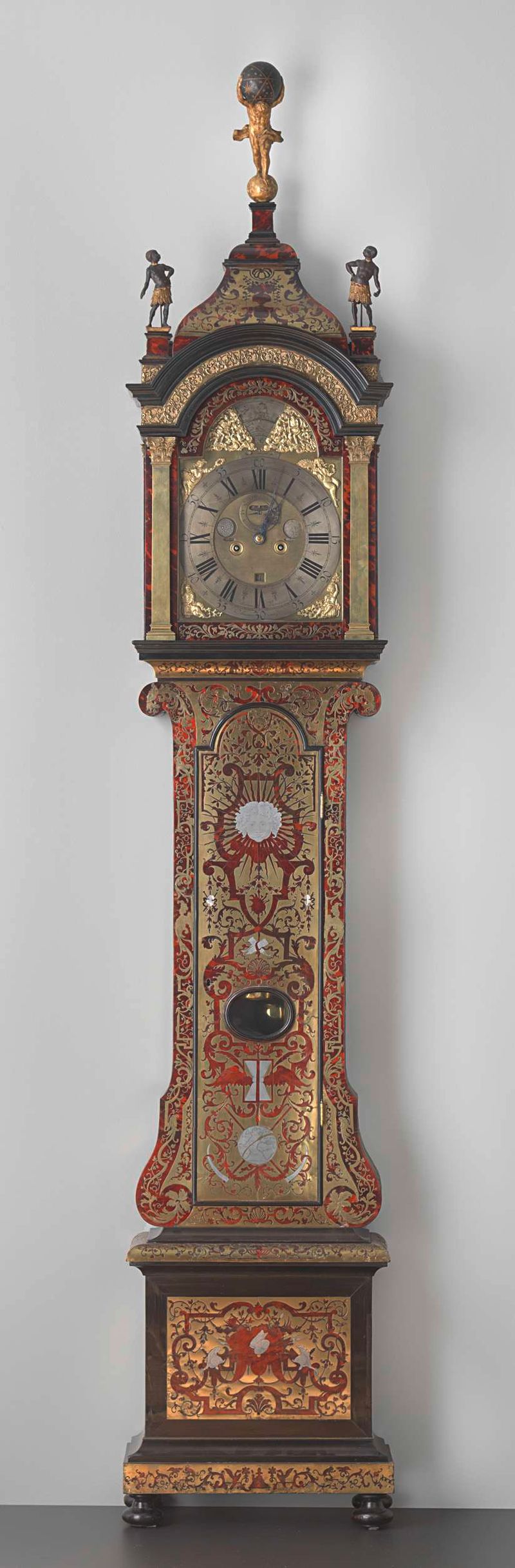 Reloj de pie de madera y tortuga de un artista desconocido
