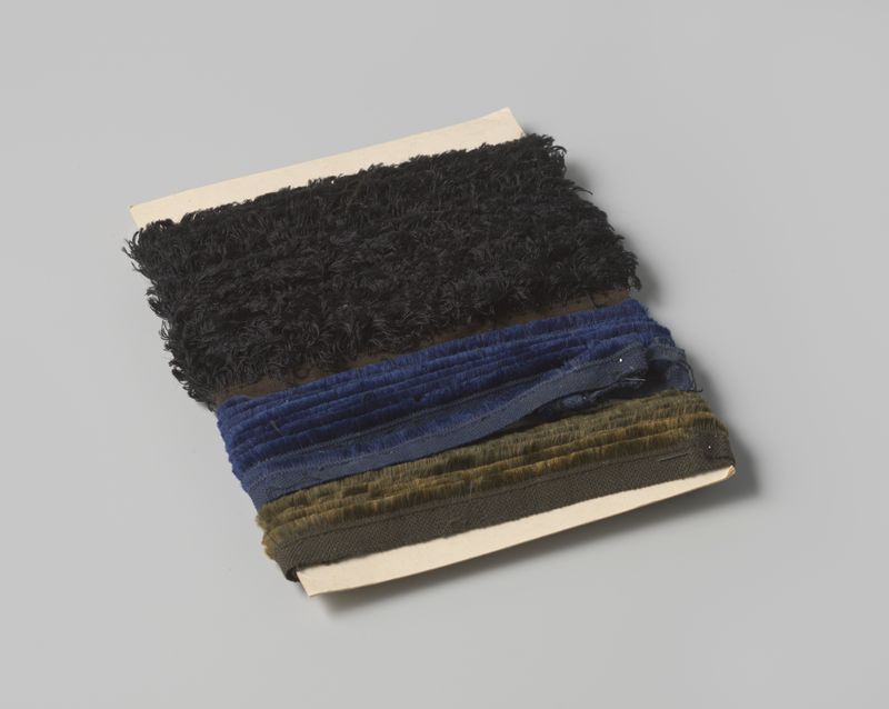 Abstract work by Gustav Schnitzler, ink on cardboard featuring black fringe.