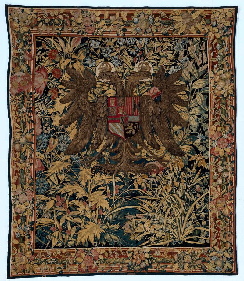 Tapestry by Willem de Pannemaker featuring a crowned double-headed eagle and flowers