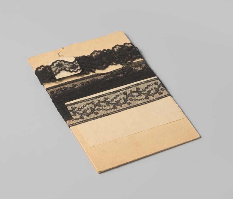 Decorative art featuring a black lace motif by Gustav Schnitzler